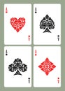 Playing card aces with decorative suit symbols