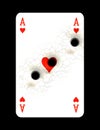 Playing card with bullet hole