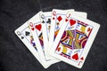 Five playing card`s a hand of a four of a kind queens and a queen Royalty Free Stock Photo