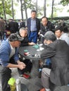 Playing card in the public park is a national pastime in China. Royalty Free Stock Photo