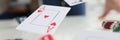 Playing cards aces and dice flying over gaming table in casino closeup Royalty Free Stock Photo