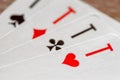 Playing cards, aces of hearts, clubs, diamonds, spades, macro close-up, selective focus