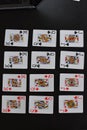 Playing cards arranged on black background