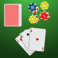 Playing cards and casino chips on a green gambling table. Blackjack game combination.