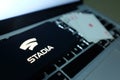 Playing cards and computer screen with the Google Stadia Royalty Free Stock Photo
