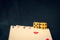 Playing cards and dice on black background Royalty Free Stock Photo
