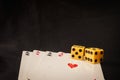 Playing cards and dice on black background Royalty Free Stock Photo