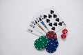 Playing cards, dice and casino chips on white background