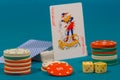 playing cards dice and chips on a green cloth Royalty Free Stock Photo