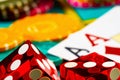 Playing cards, dice and colored poker chips from above on poker table at the casino. The concept of gambling, betting Royalty Free Stock Photo