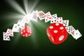 Playing cards and dice flying at the poker table Royalty Free Stock Photo