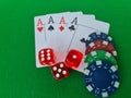 Playing cards, dice and poker chips from above on green poker table Royalty Free Stock Photo