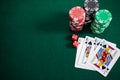 Playing cards, dices and casino chips on poker table Royalty Free Stock Photo