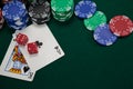 Playing cards, dices and casino chips on poker table Royalty Free Stock Photo