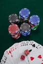 Playing cards, dices and casino chips on poker table Royalty Free Stock Photo