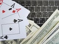 Playing cards, dollars background, keyboard, opportunity Royalty Free Stock Photo
