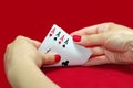 Playing Cards. Poker and aces. Red background Royalty Free Stock Photo