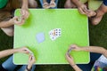 Playing cards on a garden party Royalty Free Stock Photo