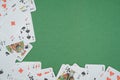 Playing cards isolated on green background Royalty Free Stock Photo