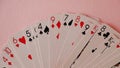 Playing cards - isolated on pink background Royalty Free Stock Photo