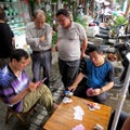 Playing cards is a national pastime in China! It reinforces social cohesion and harmony.