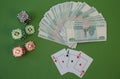 Playing cards and poker chips and cash. Gambling. Business and finance concept. Flat lay. Top view.
