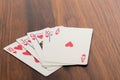 Playing cards - poker hand royal flush hearts Royalty Free Stock Photo