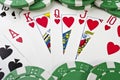 Playing cards (royal flush) and casino chips Royalty Free Stock Photo