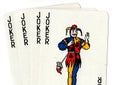 Playing cards showing four jokers