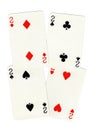 Playing cards showing four twos.