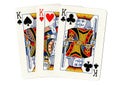 Playing cards showing three kings. Royalty Free Stock Photo