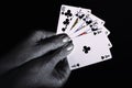 Playing cards in the silver male hands Royalty Free Stock Photo