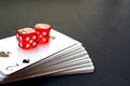 Playing cards stacked in a pile of dice Royalty Free Stock Photo