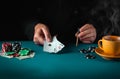 Playing cards with a winning combination in poker of three of a kind or set in the hand of a professional player. Success or Royalty Free Stock Photo