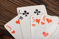 Playing cards on a wooden table Royalty Free Stock Photo