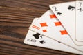 Playing cards on a wooden table Royalty Free Stock Photo