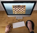 Playing chess with the computer Royalty Free Stock Photo