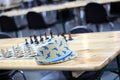 Playing chess. Summer accessories, hat. Black an white Chess pieces. Moving the pieces in chess game. Beautiful chess. Stock photo