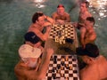 Playing chess in the water with kibitzers
