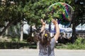 Playing in the city with a huge bubble