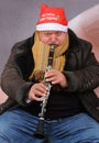 Playing clarinet on Christmas day Royalty Free Stock Photo