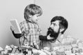 Playing with daddy. building home with constructor. child development. happy family leisure. father and son play game Royalty Free Stock Photo