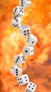 playing dice arranged in a row on a flame background