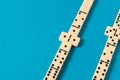 Playing dominoes on a blue table. Domino effect Royalty Free Stock Photo