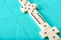 Playing dominoes on a blue wooden table Royalty Free Stock Photo