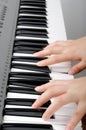 Playing electronic organ Royalty Free Stock Photo