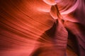 Playing the flaming wave of the underground labyrinth of the sand walls of Lower Antelope Canyon in Page Arizona is the real art