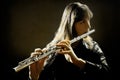 Playing flute player Royalty Free Stock Photo