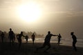 Playing football on the gambian beach