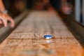 Playing a game of shuffleboard.. Royalty Free Stock Photo